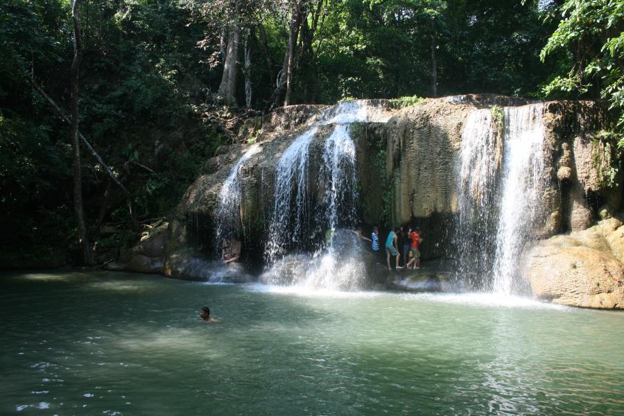 Kids swimming at Erawan Falls